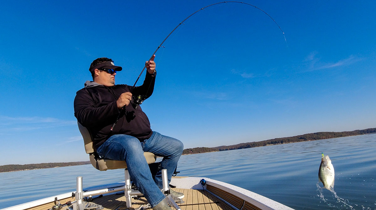 Jason swinging big crappie on spinning gear